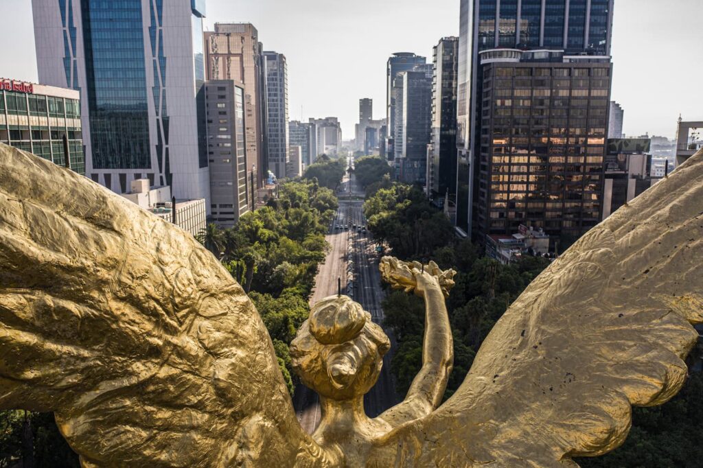 Angel of Independence overlooking Reforma Avenue in the summer month of July.