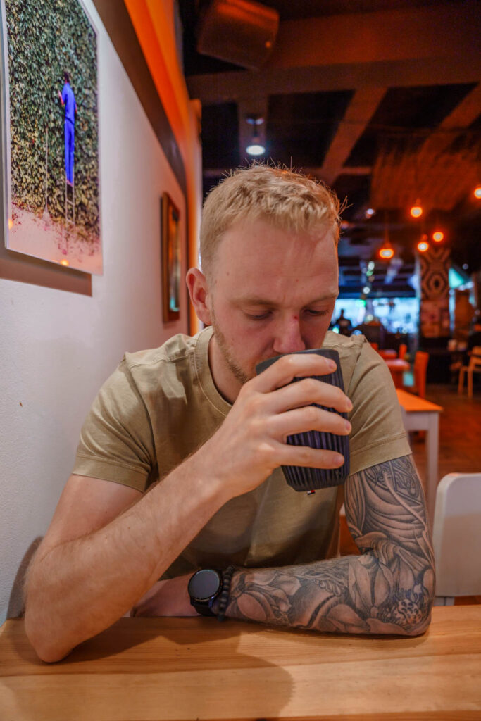 Blogger Robin drinking coffee at Boicot Cafe in La Condesa.