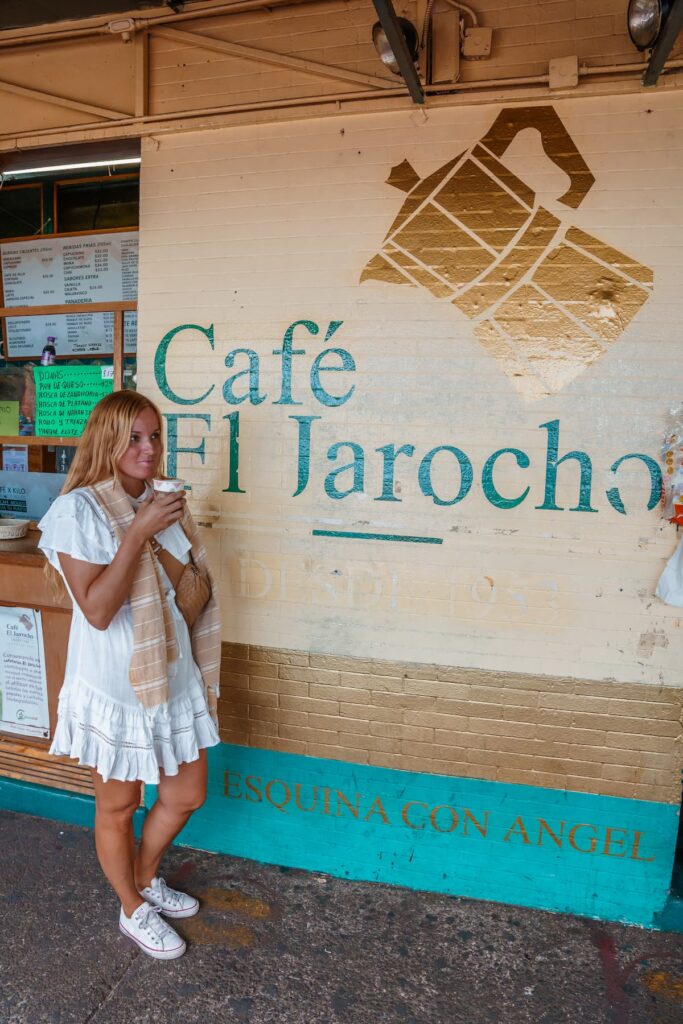 Blogger Mal drinking at El Jarocho in Coyoacan - best coffee shops in Mexico City.