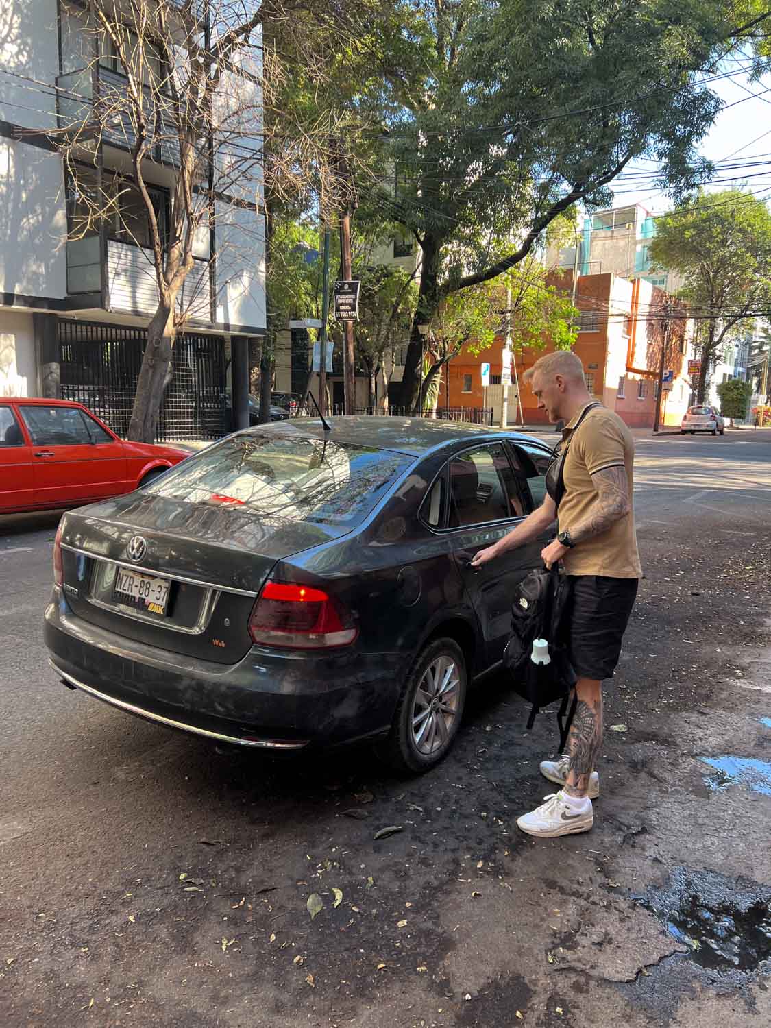 Blogger Robin getting into Uber car in La Condesa.