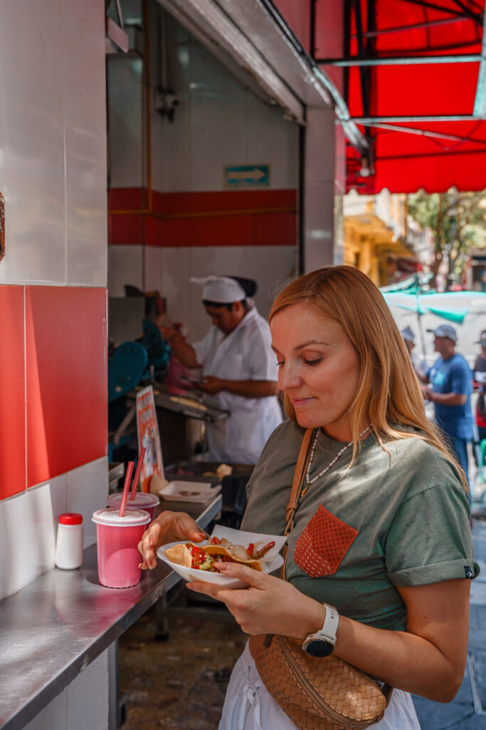 Blogger Mal during a taco tour, one of our favourite activities in Mexico City