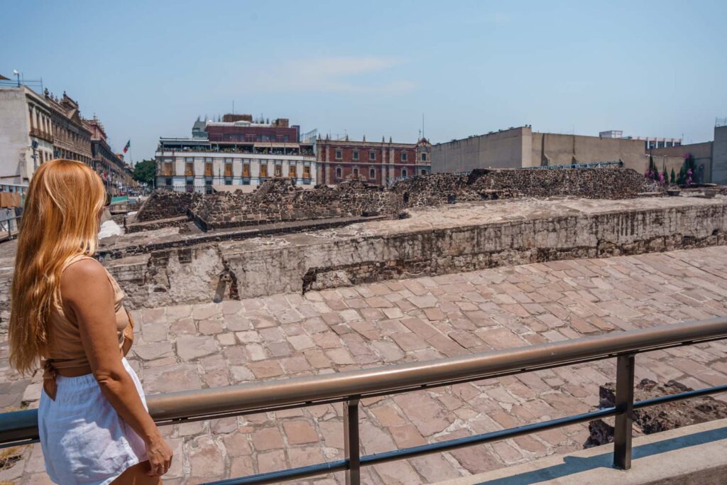 Blogger Mal exploring Templo Mayor in Downtown