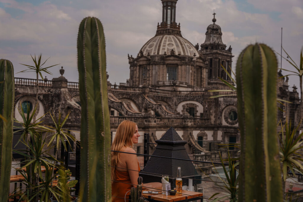 Blogger Mal having a drink at Terraza Catedral one of best rooftop bars in Mexico City.
